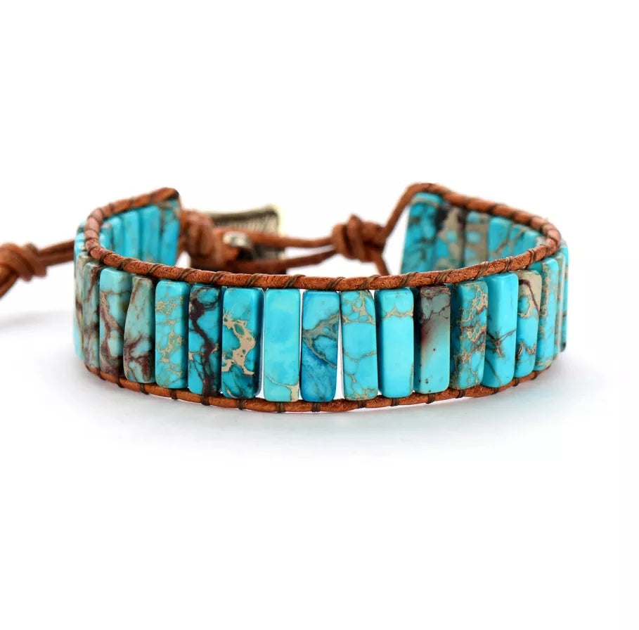 P103952 PULSERA CON PIEDRAS RECTANGULARES COLOR TURQUESA.