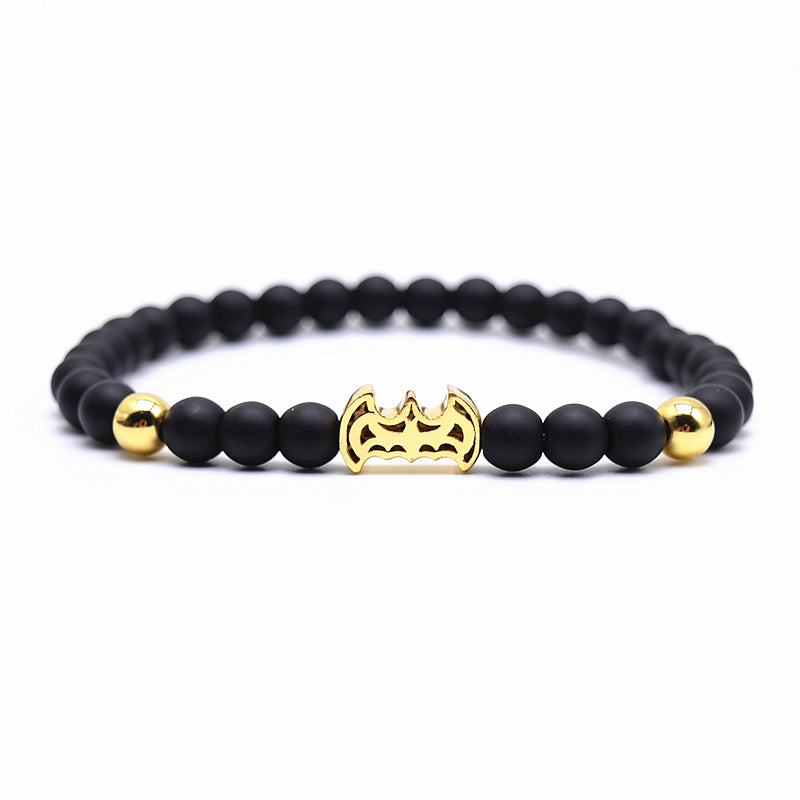 P92703 PULSERA DE BATMAN CON CUENCAS NEGRAS Y WHITE GOLD.