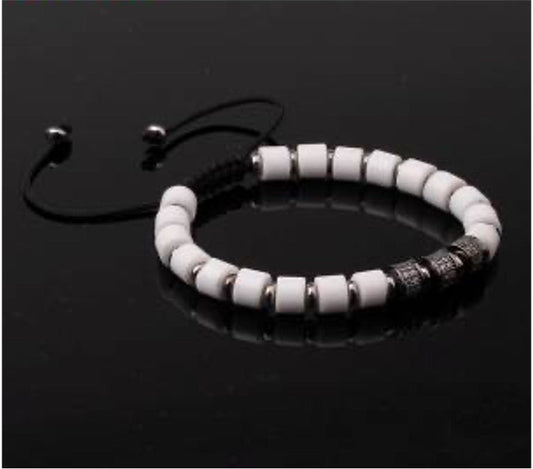 P93421 PULSERA DE îNIX BLANCO Y ACERO INOX COLOR VINTAGE CON CIRCONES BLANCO.