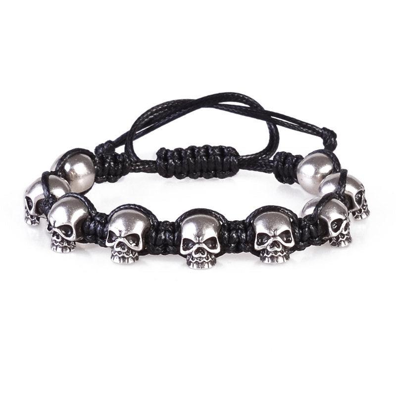 P95802 PULSERA DE CALAVERA PLATEADA Y TRENZADO NEGRO AJUSTABLE.