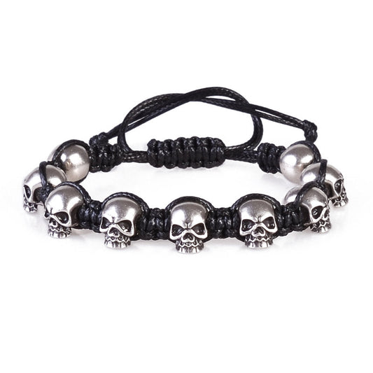 P95802 PULSERA DE CALAVERA PLATEADA Y TRENZADO NEGRO AJUSTABLE.
