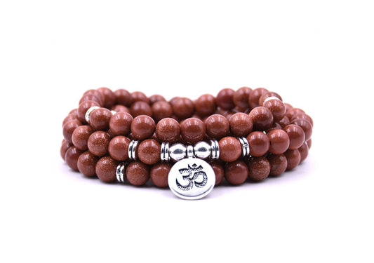 P97715 PULSERA ENROLLABLE DE PIEDRA ARENA DORADA Y MEDALLA